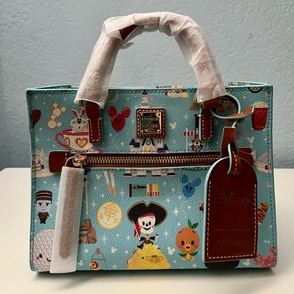 Dooney & Bourke Handbags - NWT Disney Dooney and Bourke Jerrod Maruyama crossbody purse